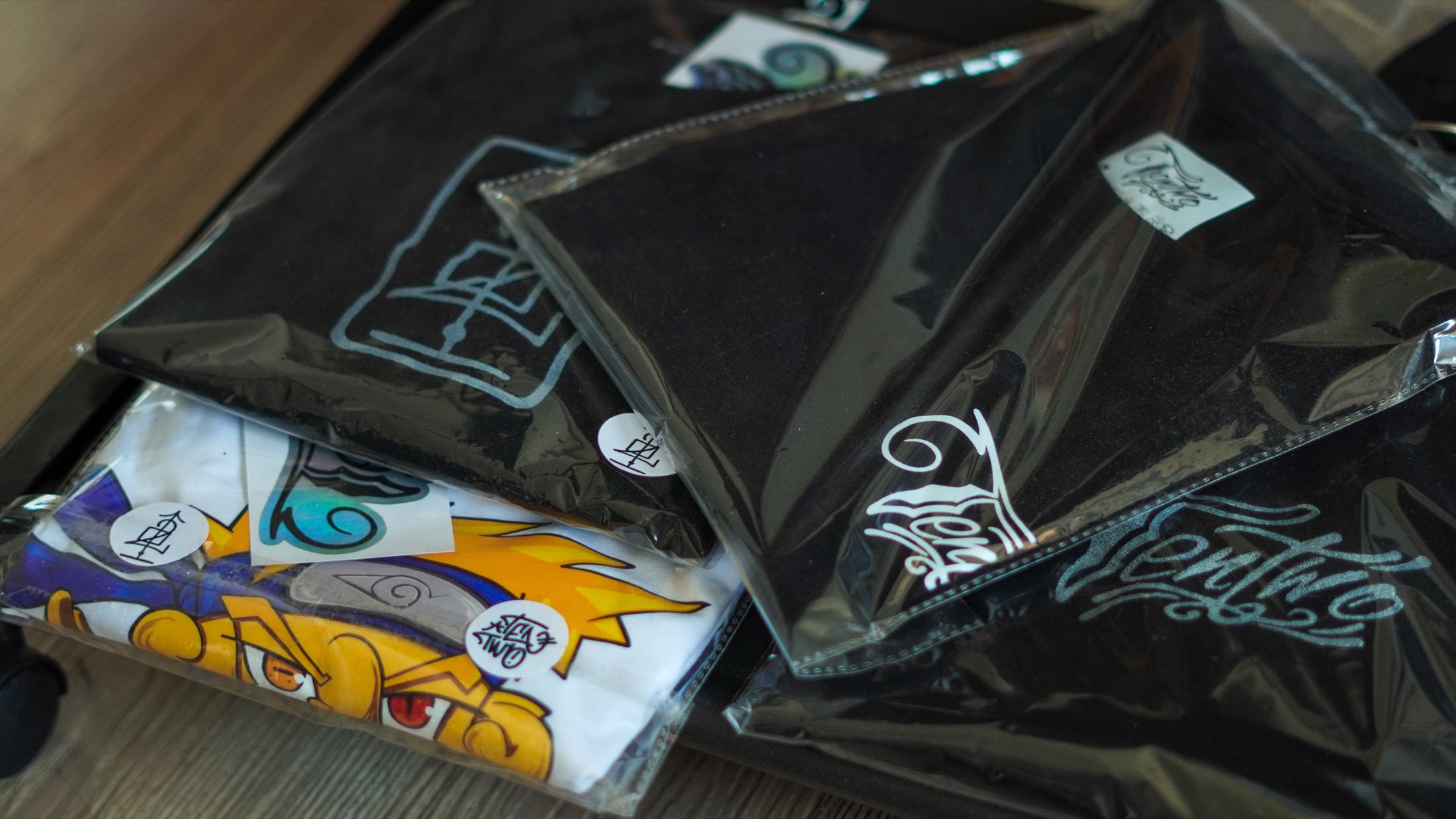 TenTwo folded merchandise laid out on a table